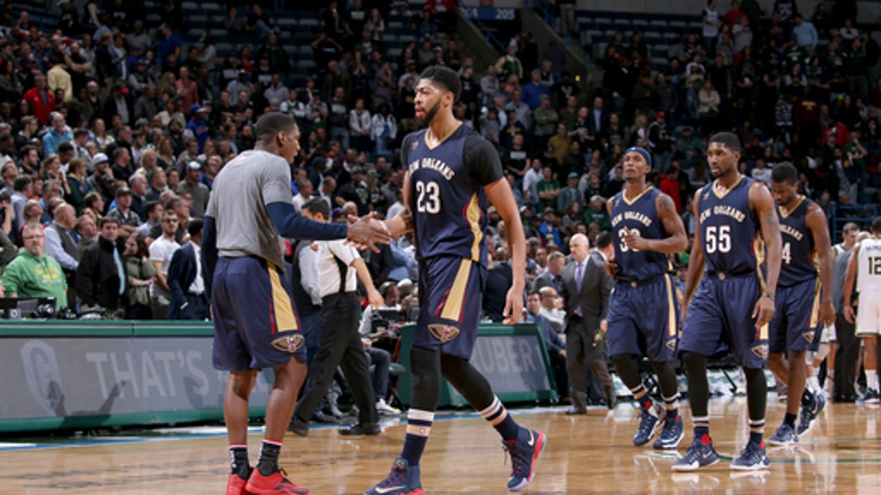 Davis, Holiday lift Pelicans past Blazers, 113-101